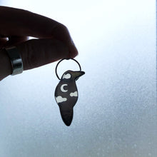 Load image into Gallery viewer, Crow totem necklace agains window